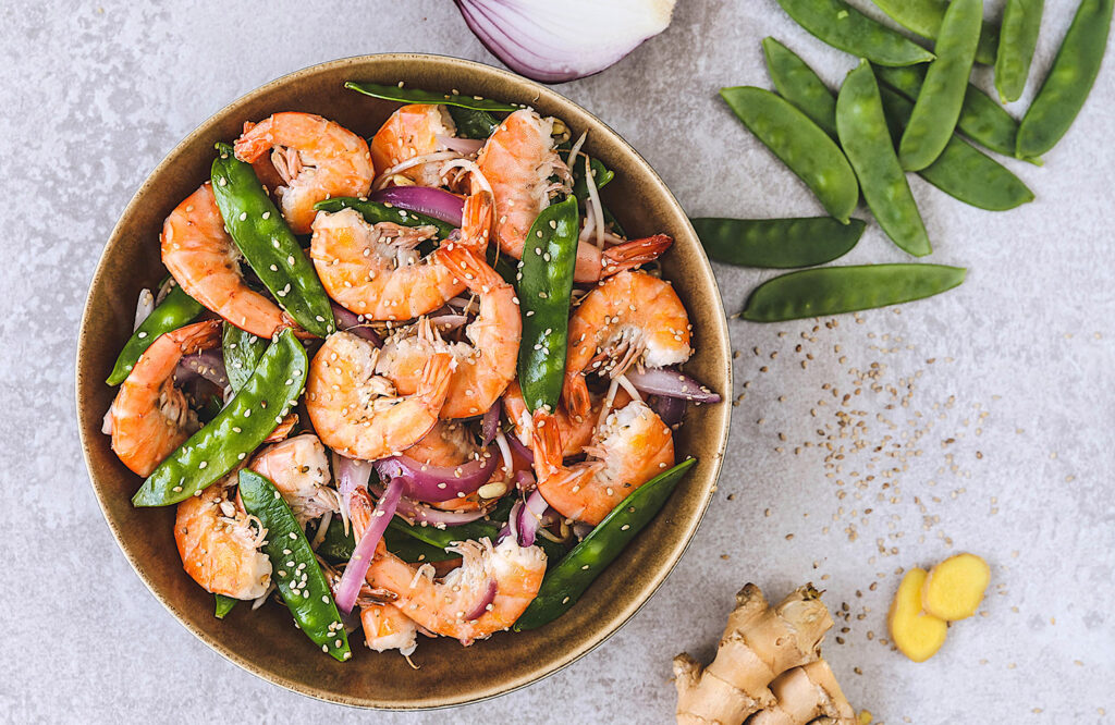 Recette Food4Good - Wok de gambas bio aux pois gourmands et huile de coco